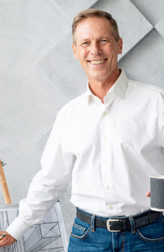 _a href=_https___www.magnific.com_free-photo_architect-looking-camera-while-showing-his-pl
