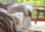 White stonewashed custom linen bedding in modern farmhouse interior