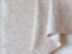 Beige and white upholstery fabric in boucle texture