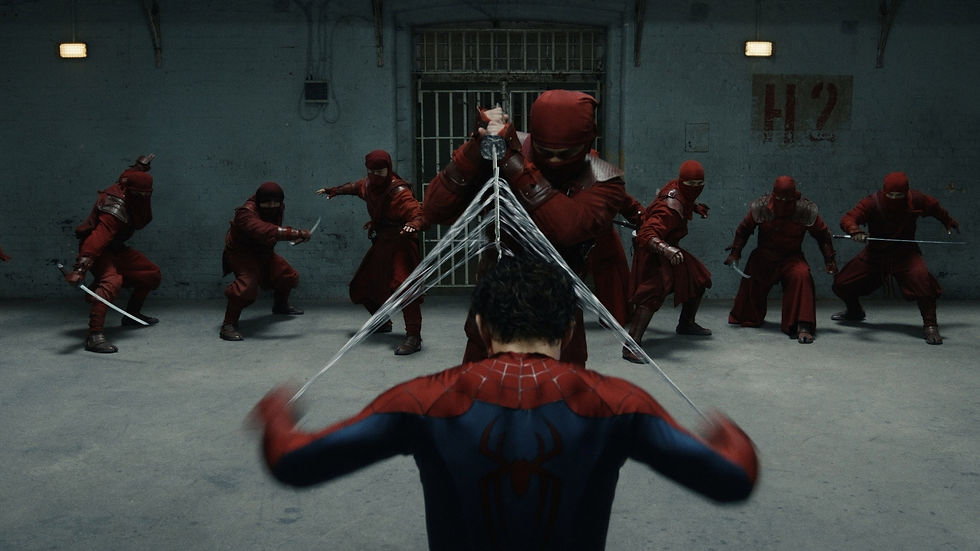 Spider-Man webbing seven red ninja warriors in a dim prison room, with H2 on the wall and a tense standoff.