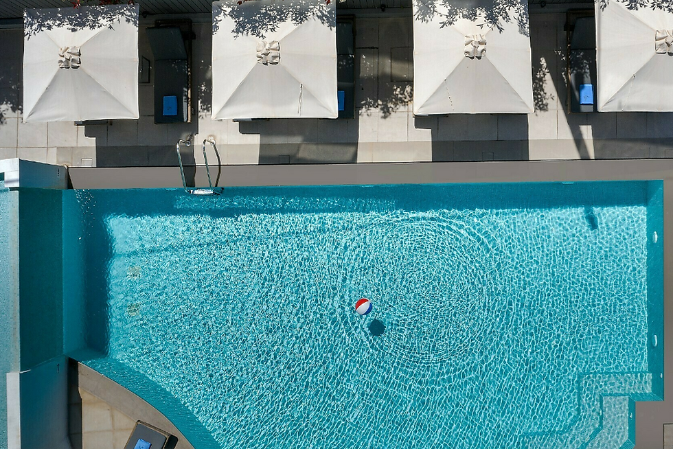 A luxury hotel s pool area in Athens Riviera