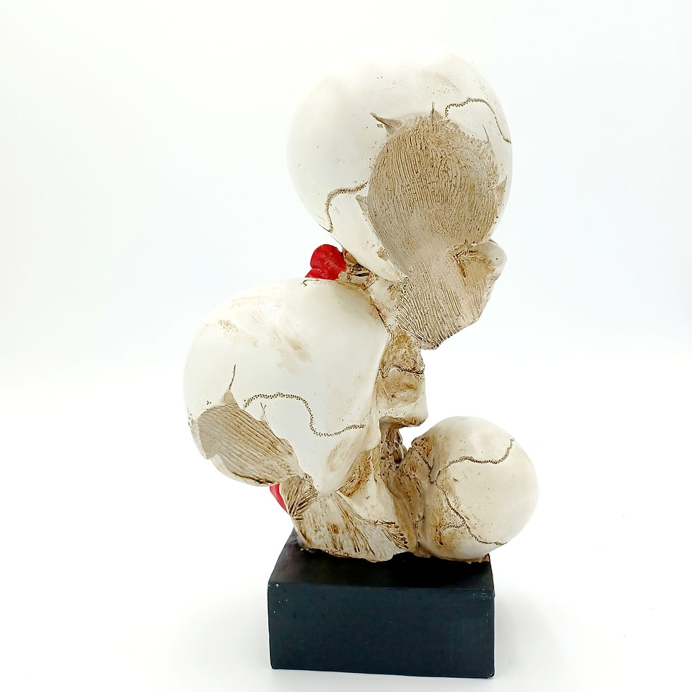 Miniature : Sculpture famille de tête de mort sur un lit de roses