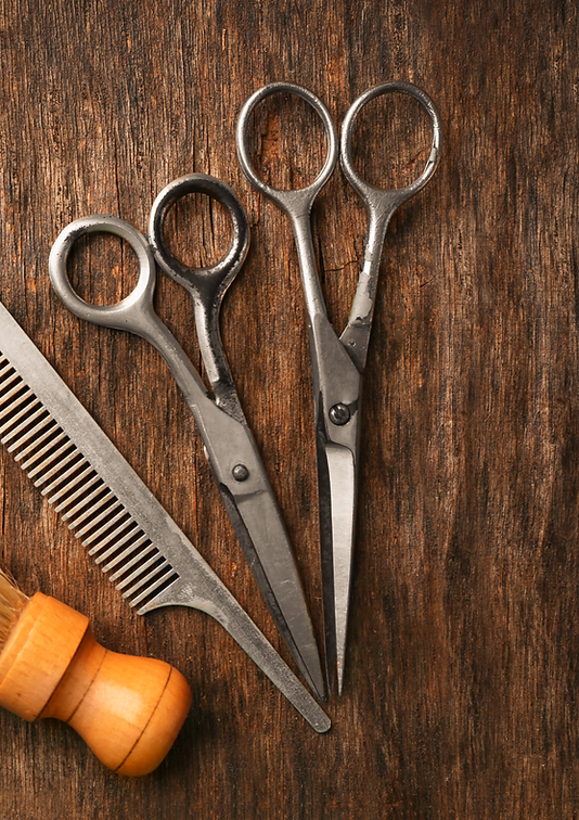 Vintage tools of barber shop on wooden board