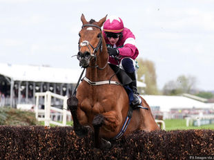 Gold Dancer and jockey Paul Townend during the William Hill Mildmay Novices' Chase on day two of the Randox Grand National Festival 2026 at Aintree Racecourse.