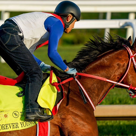 Forever young with his exercise rider in preparation for the 2024 Kentucky Derby.