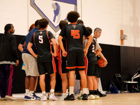 MBP Basketball players huddling with coaches during a youth basketball game in New Jersey