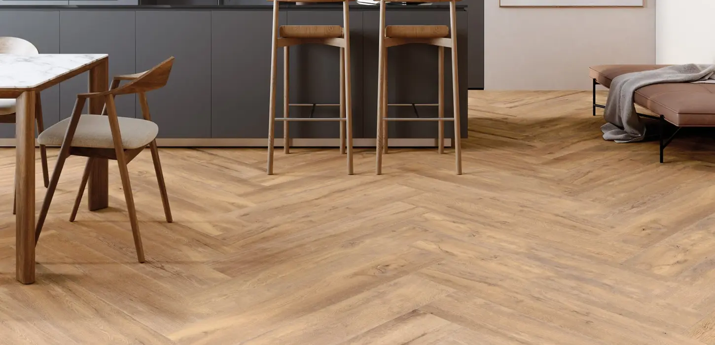 Armatile Elgrove wood-effect porcelain floor tiles in herringbone pattern in contemporary kitchen interior