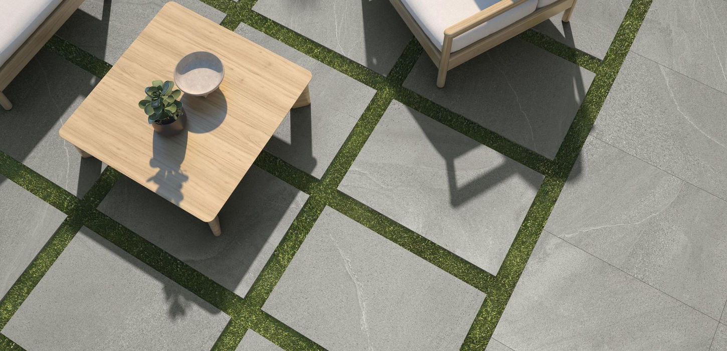 Armatile Pelhamstone outdoor porcelain paving tiles in contemporary grid garden paving design