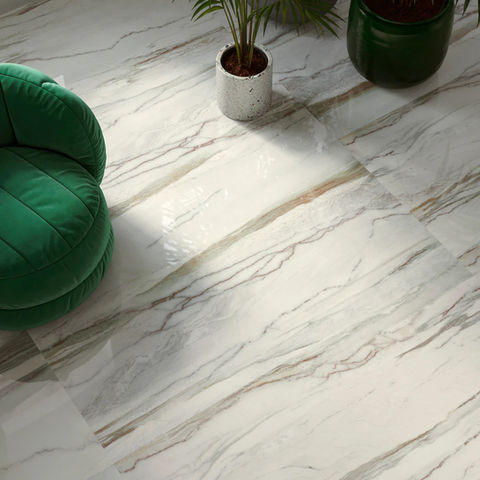 Green and white marble effect porcelain tiles in a living room setting