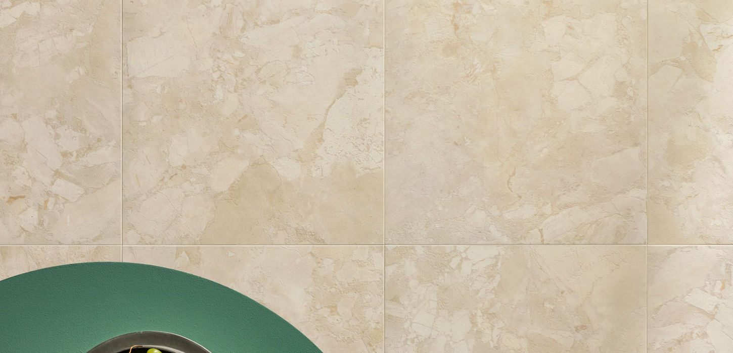 Armatile Alvarra stone-effect porcelain floor tiles in contemporary bathroom with sea view