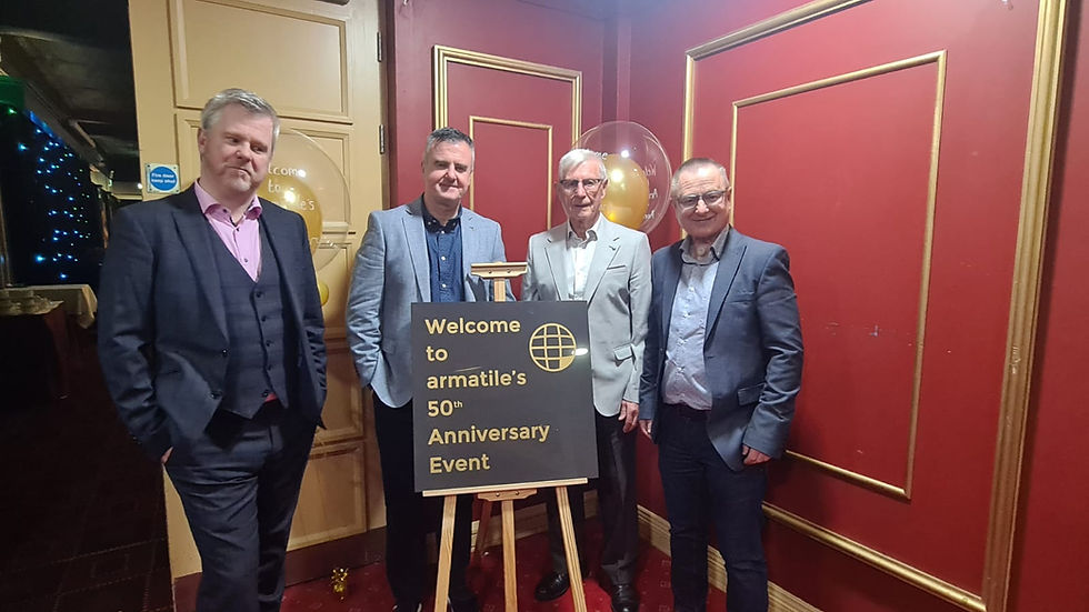 Seamus McCann and family celebrating Armatile's 50th anniversary event