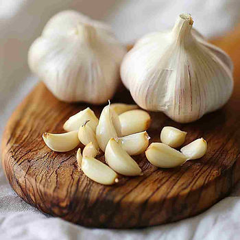 fresh garlic on a cutting board