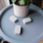 concrete pot feet, or plant toes next to a concrete planter