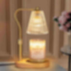 a candle warmer lamp warming a candle