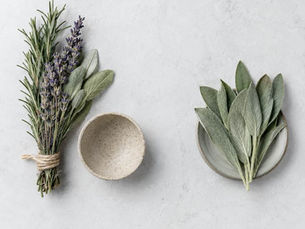 Herbal smoke cleansing bundle and sage displayed separately to illustrate smoke cleansing versus smudging