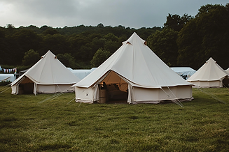 u4664179765_Three_glamping_tents_in_the_grassy_area_of_an_out_8c9f0e4d-1cb8-4d85-bcac-a794