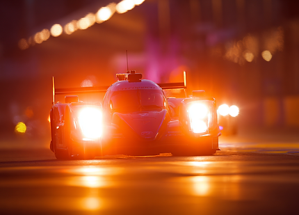u4664179765_the_race_car_of_the_day_is_on_track_at_night_in_l_70d240a6-6c3c-4c2e-8965-6e93