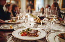u4664179765_A_photo_of_people_enjoying_an_elegant_dinner_at_t_2e4f0118-0d9a-471b-8262-0a81