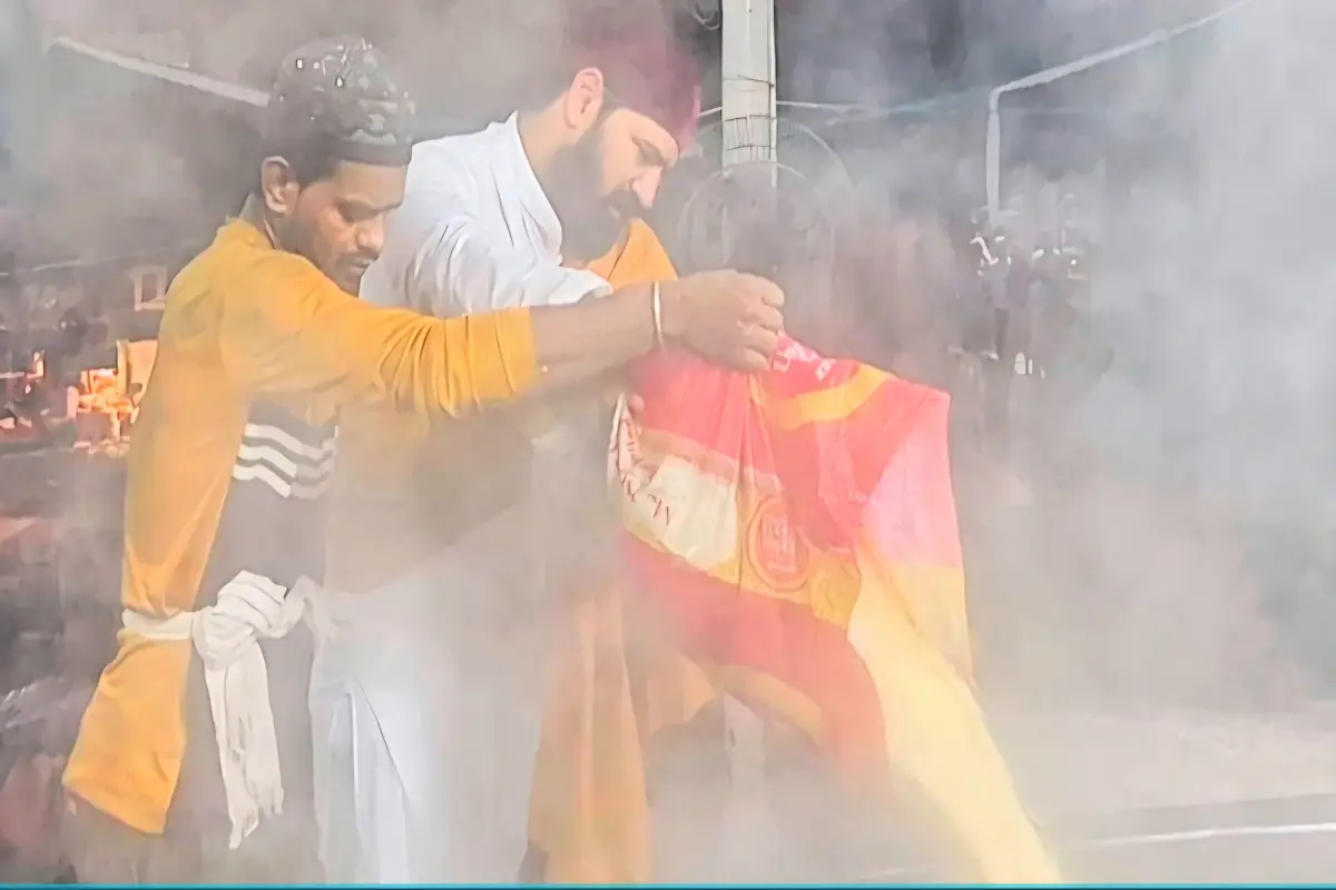 Crowd management near shrine corridor guided by khadims respectfully