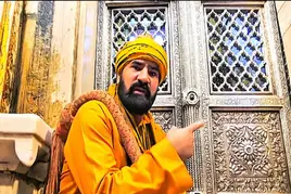 Khwaja Garib Nawaz Khadim guiding devotees at Ajmer Sharif Dargah entrance