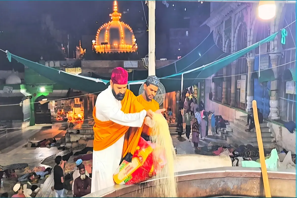 Devotees walking towards Ajmer Sharif Dargah entrance for ziyarat