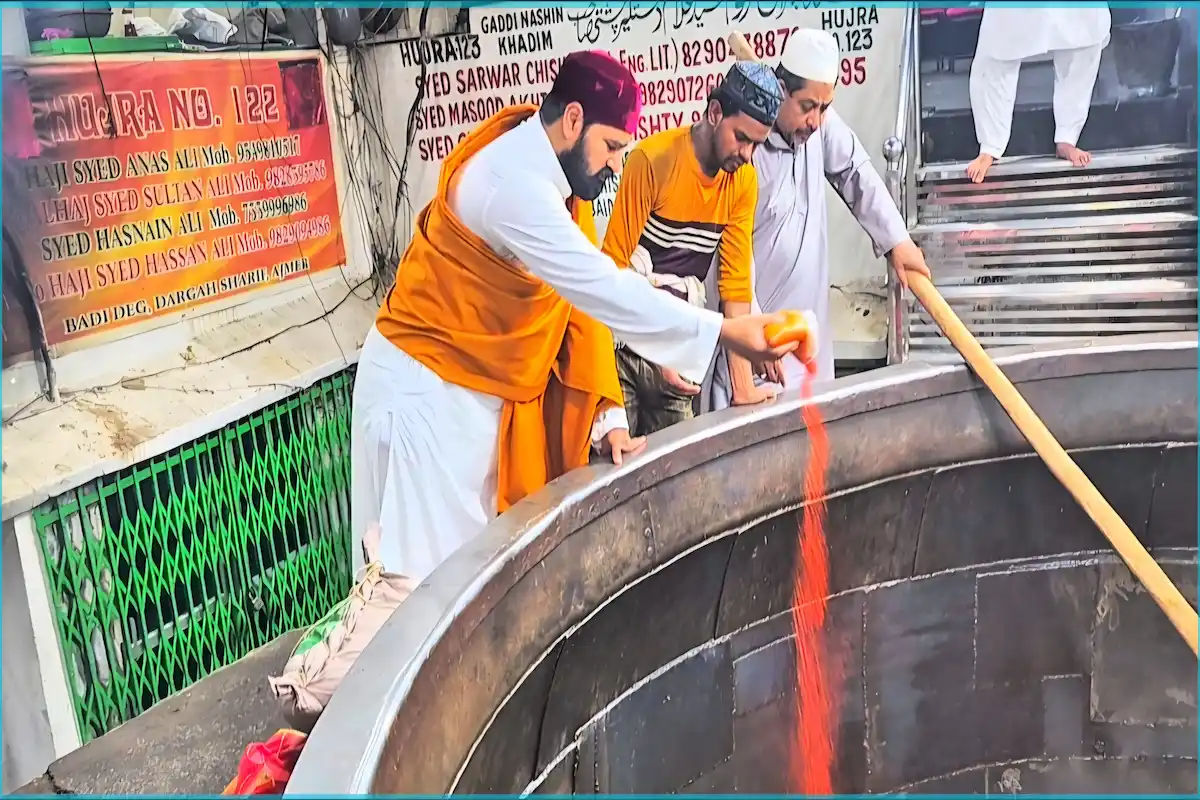 Ajmer Sharif Dargah khadims assisting visitors during busy hours