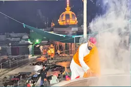 Khwaja Garib Nawaz Khadim preparing Deg near Ajmer Sharif shrine at night