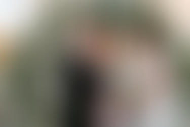 Groom and bride exchanging rings during a symbolic ceremony