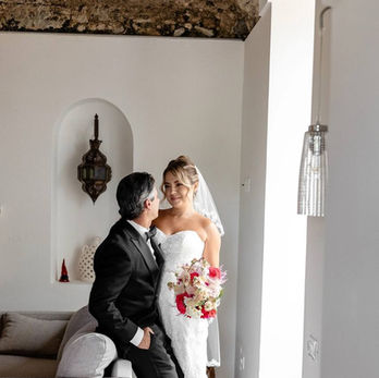 Bride and groom sharing an intimate moment inside Italian villa during Amalfi Coast elopement