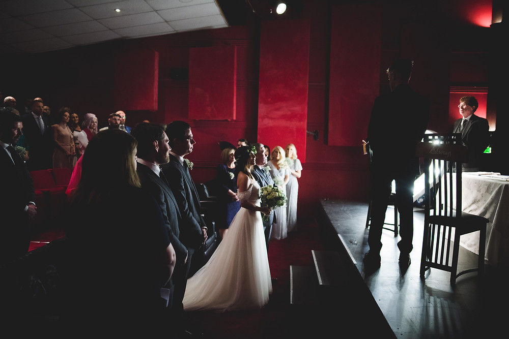 Side view of wedding ceremony at Birmingham's Electric Cinema
