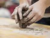 Hands Shaping Clay