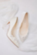 Bride's floral footwear captured by Baskin Creative Co., Regina wedding photographer.