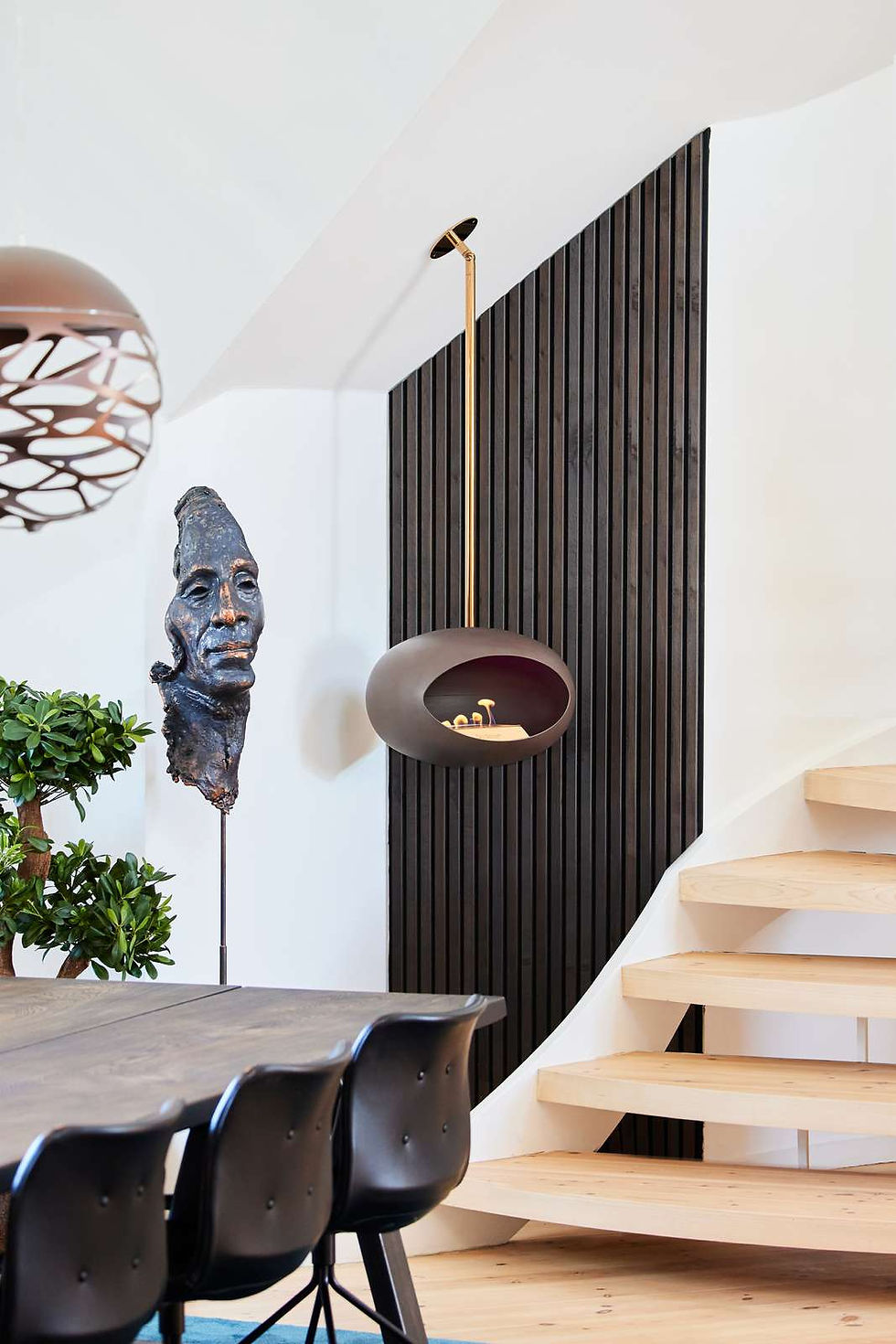 Mocca colour dome with bioethanol flames ceiling hung on a long pole