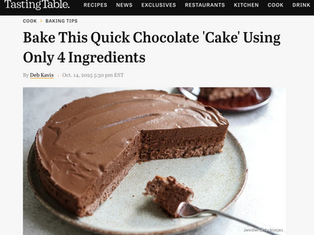 Kristina Lavallee comparing a minimal-ingredient chocolate cake recipe to a fully developed cake in a professional bakery kitchen.