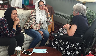 SLU Students and Mentor having a conversation