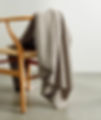 Throw blanket on wooden chair