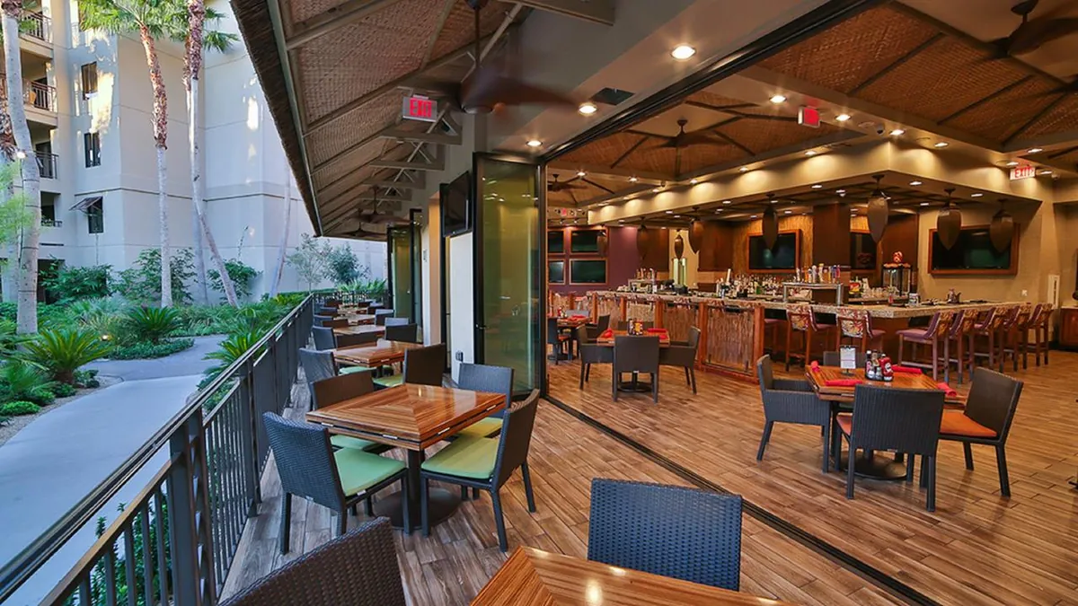 Outdoor restaurant patio at Tahiti Village