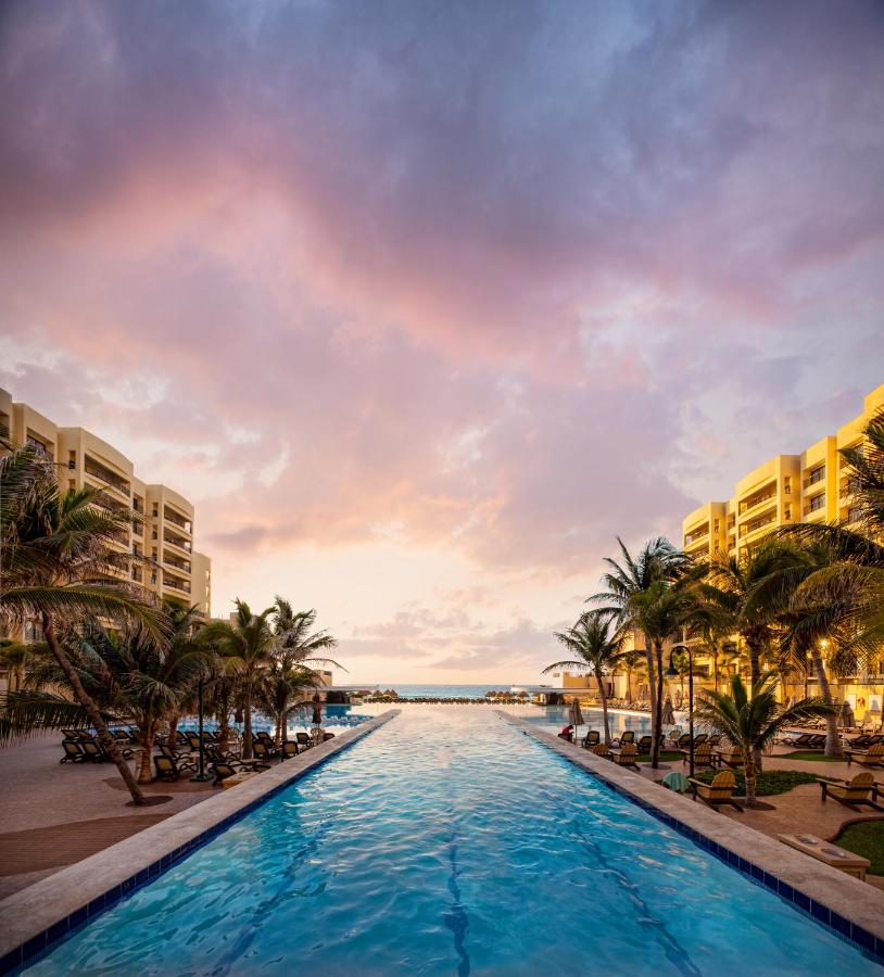 The Royal Sands in Cancun infinity pool at sunset