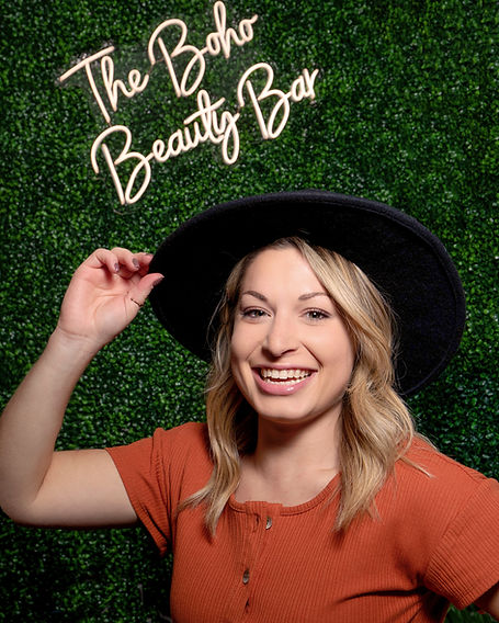 Headshot with hat.jpg