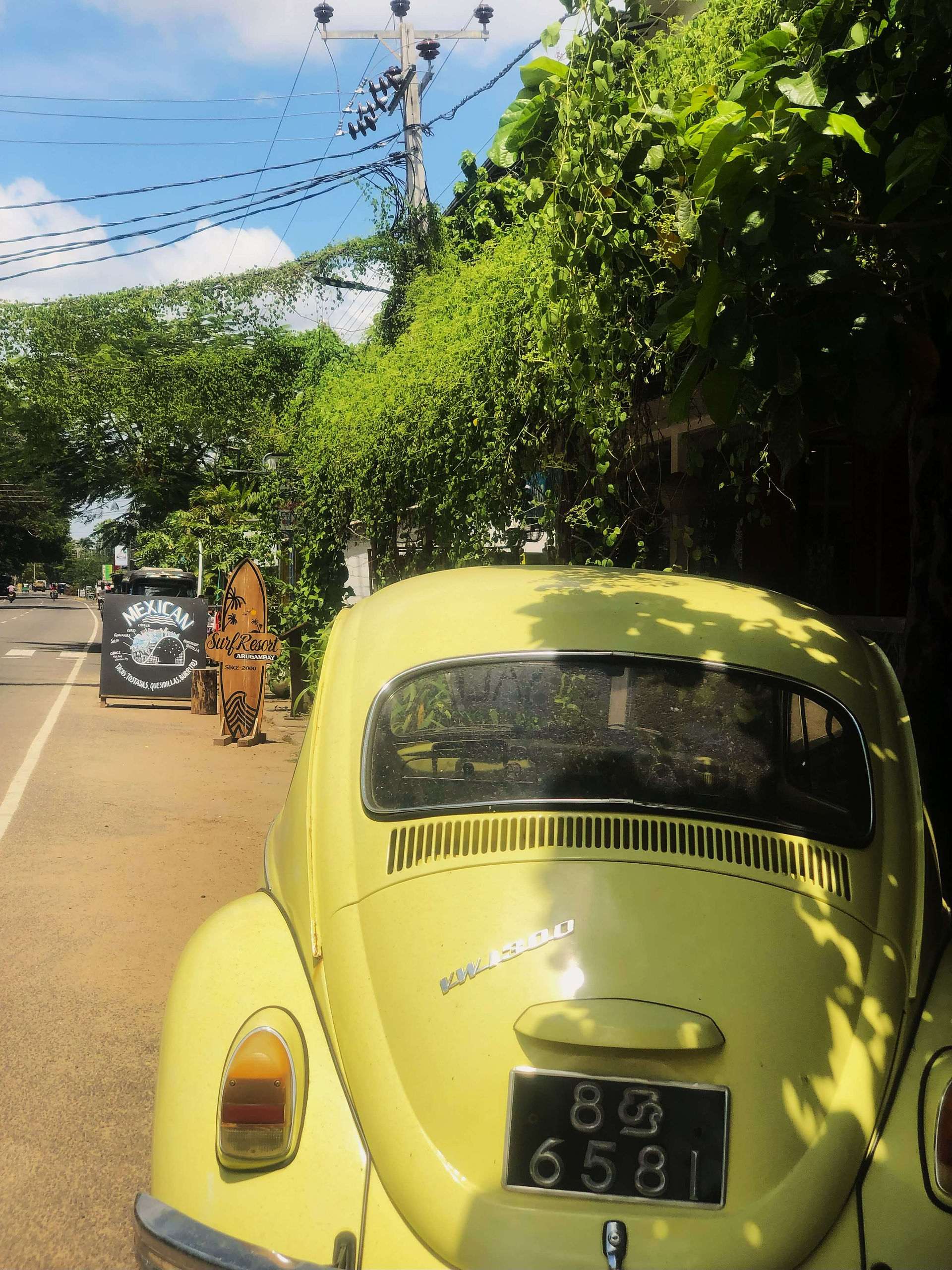 Aesthetic cafes in Arugam Bay town serving coffee, pastry and smoothie bowls. Squeeze Me has a yellow vw beetle outside!