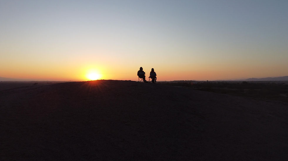 Kate and Mike sat in an overlanding spot in the Nazca Desert during their two months in Peru