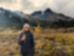 Top things to do in Ushuaia: Kate drinking a glass of champagne on a Helicopter tour in Ushuaia