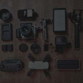 Vlogger equipment including camera, mic from overhead perspective