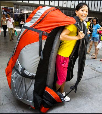lady with human sized backpack