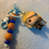 Thumbnail: Keychain: blonde detective Funko Pop-style figure, brown and blue beads.