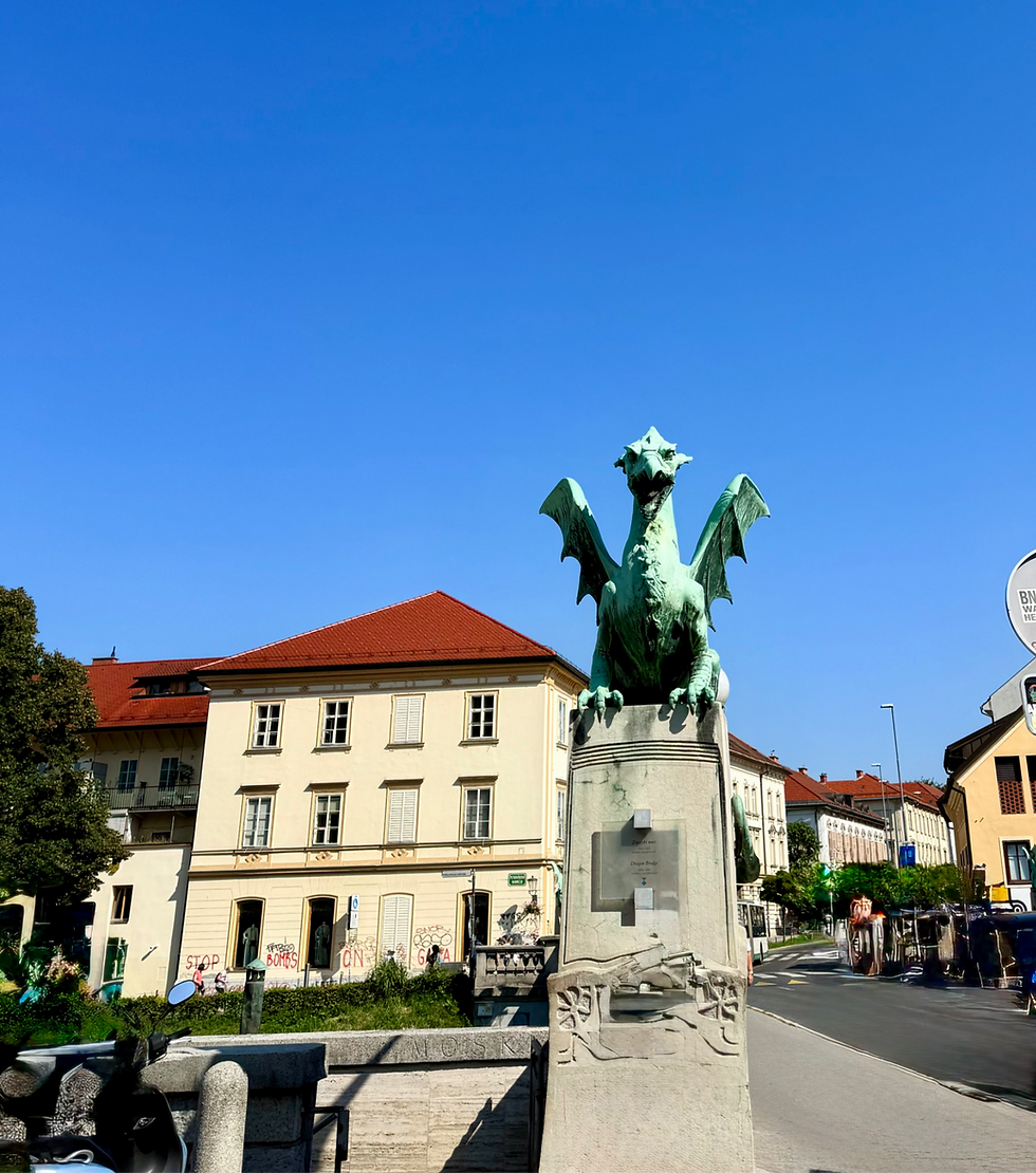 A bridge in Ljubljana with a dragon statue