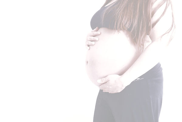 pregnant holding her tummy_edited_edited_edited.jpg