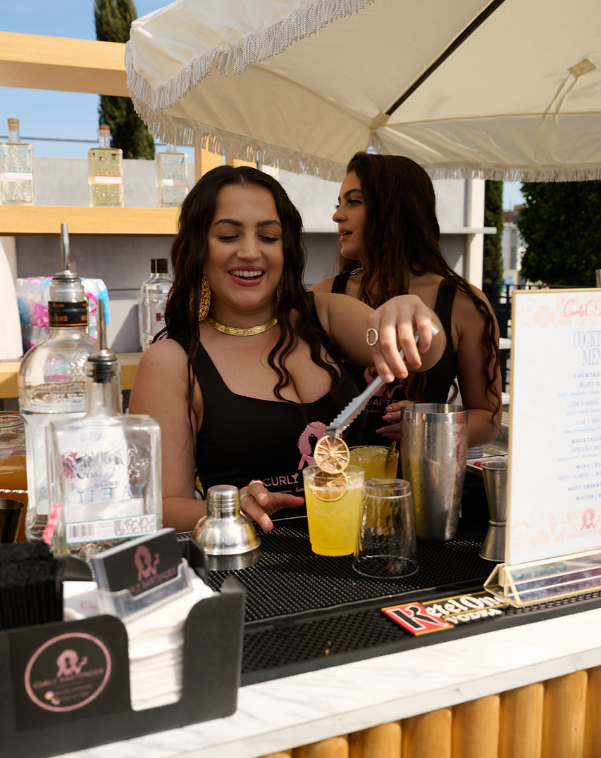 Networking at Curly Con brand activation event with Curly Bartender mobile bar