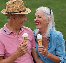 adorable-senior-couple-enjoying-some-ice-cream-together-outdoors.jpg