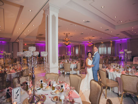 Elegant New Jersey wedding reception ballroom with candlelit tables and full-service catering setup